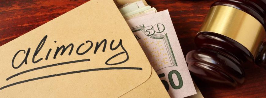 Alimony concept. An envelope with cash on a table. Alimony concept. An envelope with cash on a table.